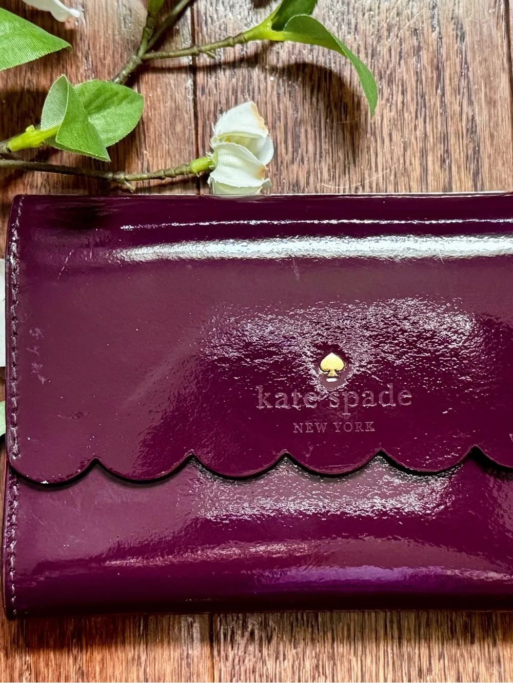 KATE SPADE Mahogany/Radish Lily Avenue Patent Leather Kieran Trifold Wallet